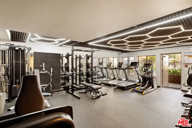 a view of a room with gym equipment