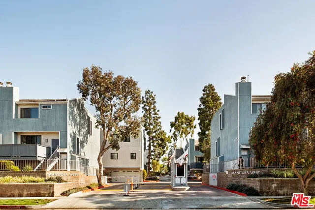 a view of a city with tall buildings