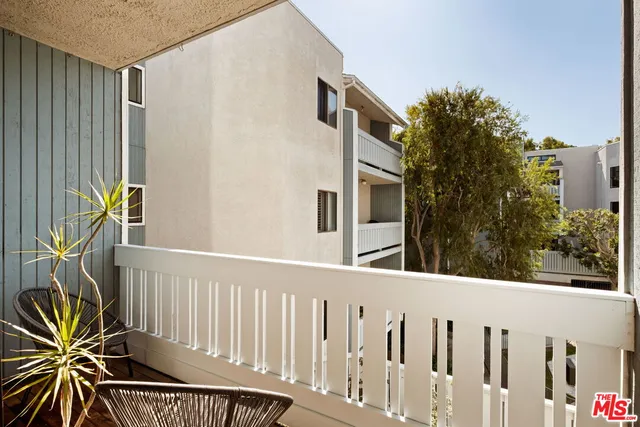 a view of a street from a balcony