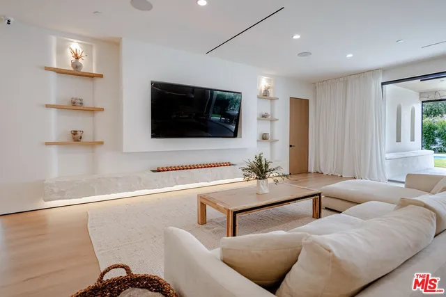 a view of swimming pool with a chair