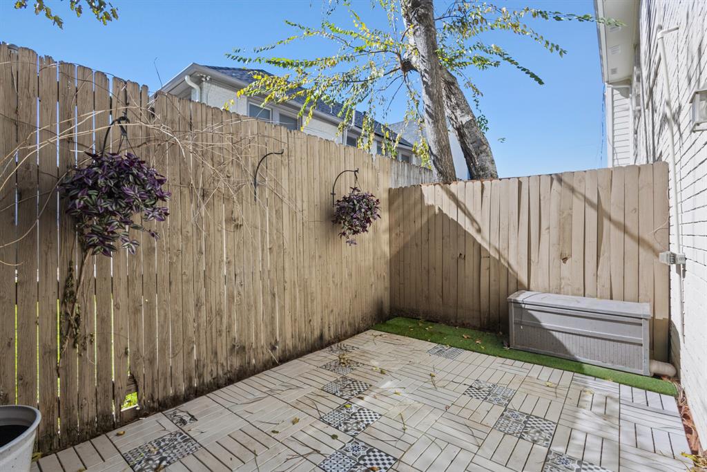 2806 Knight Street, Unit 103 Dallas, TX 75219 - Photo 16 of 17 a view of wooden wall