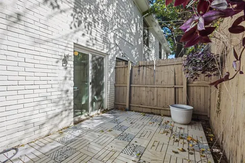a view of a backyard of a house with a sink