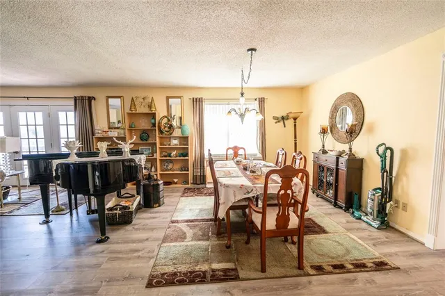 a view of a living room and dining room