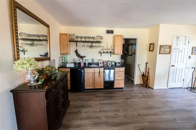 a view of a living room and entry way