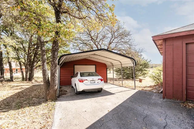 a car parked in front of a house