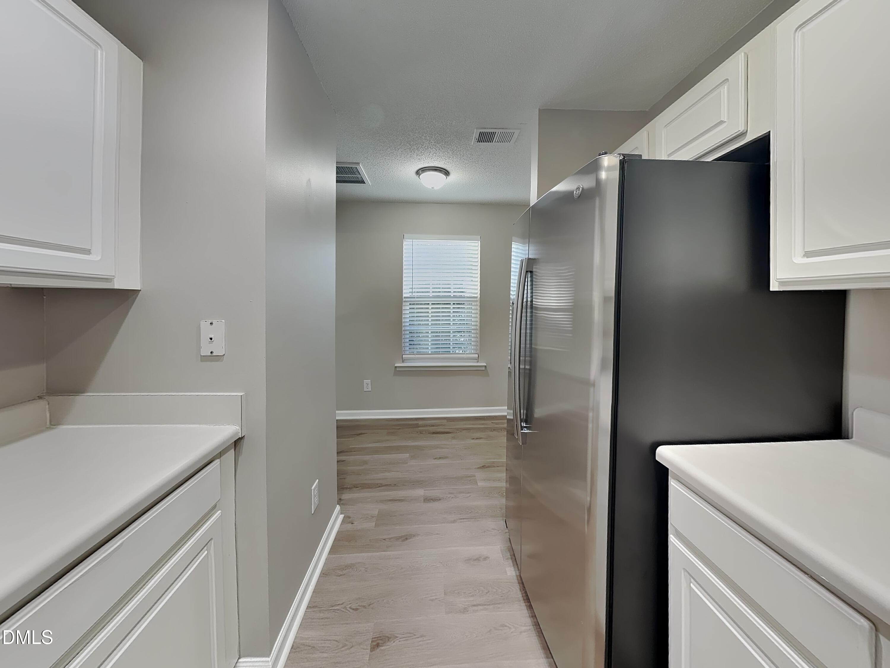 8109 Bright Oak Trail Raleigh, NC 27616 - Photo 5 of 15 a bathroom with a sink and a mirror