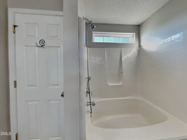 a bathroom with a tub