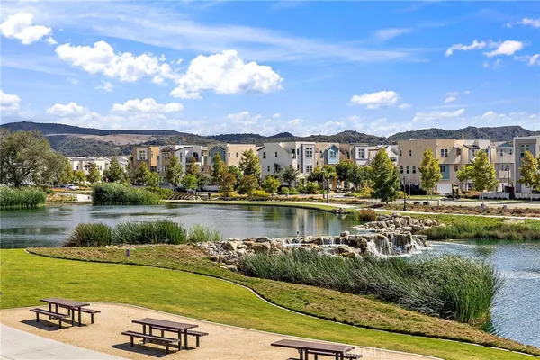 a view of a lake with a city