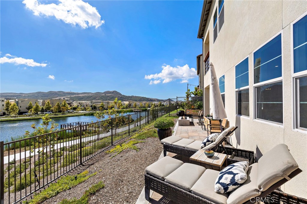 896 Sunrise Road Rancho Mission Viejo, CA 92694 - Photo 27 of 42 a view of a balcony with chairs and a table