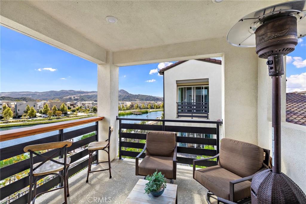896 Sunrise Road Rancho Mission Viejo, CA 92694 - Photo 34 of 42 a living room with furniture and a large window