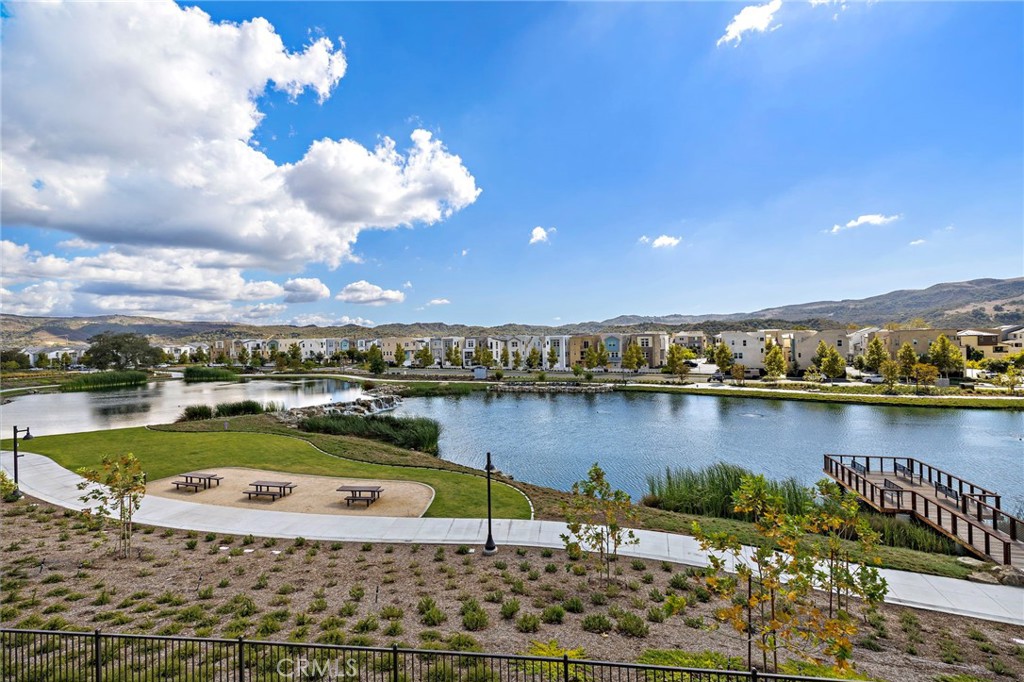 896 Sunrise Road Rancho Mission Viejo, CA 92694 - Photo 35 of 42 a view of a lake with a city