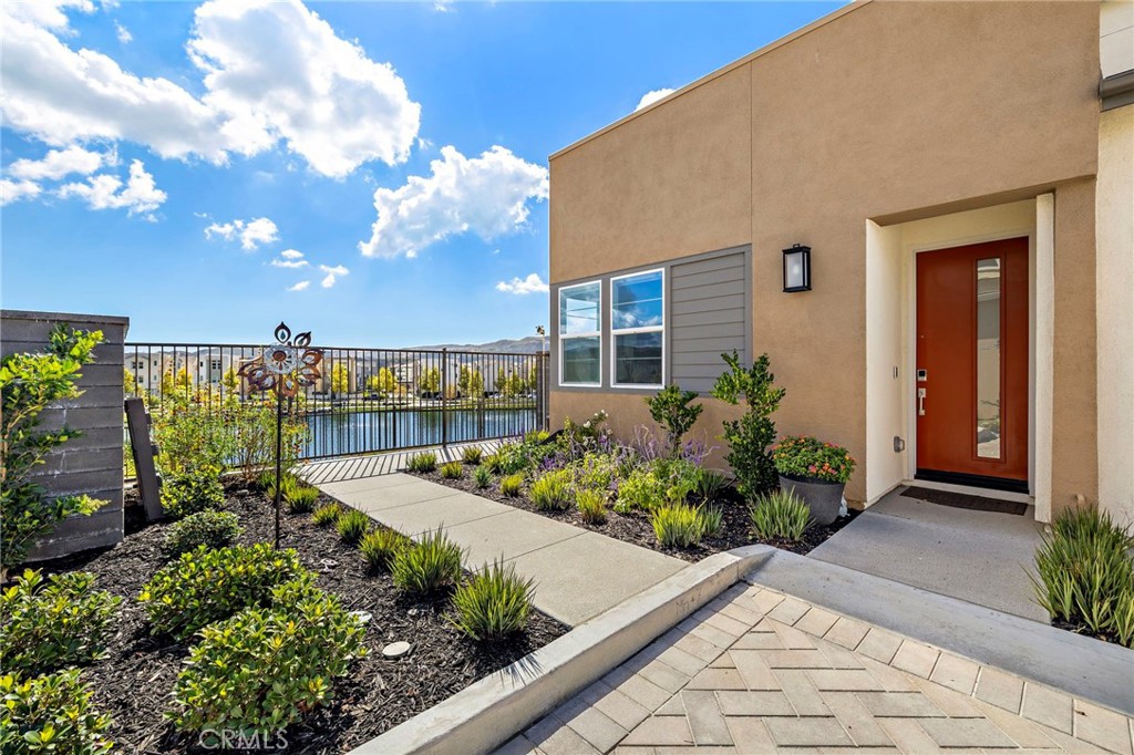 896 Sunrise Road Rancho Mission Viejo, CA 92694 - Photo 4 of 42 a view of a house with a garden