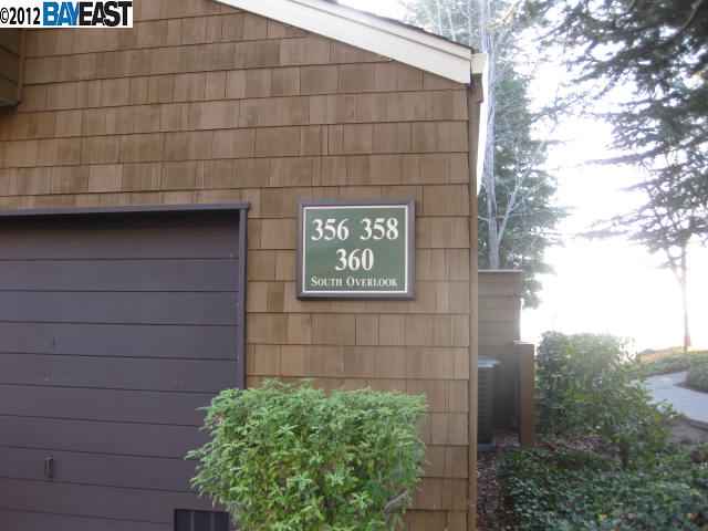 360 South Overlook Drive San Ramon, CA 94582 - Photo 1 of 1 a brick building with a black door