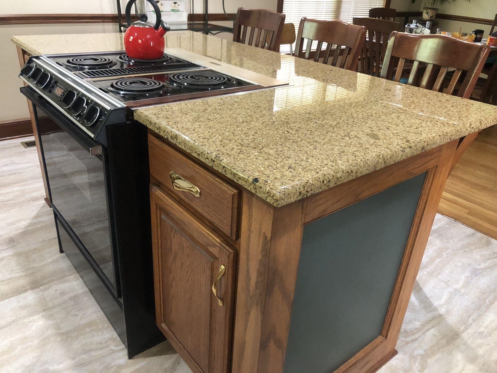 3334 Oak Road Bartlett, TN 38135 - Photo 12 of 40 a kitchen with a stove and a sink