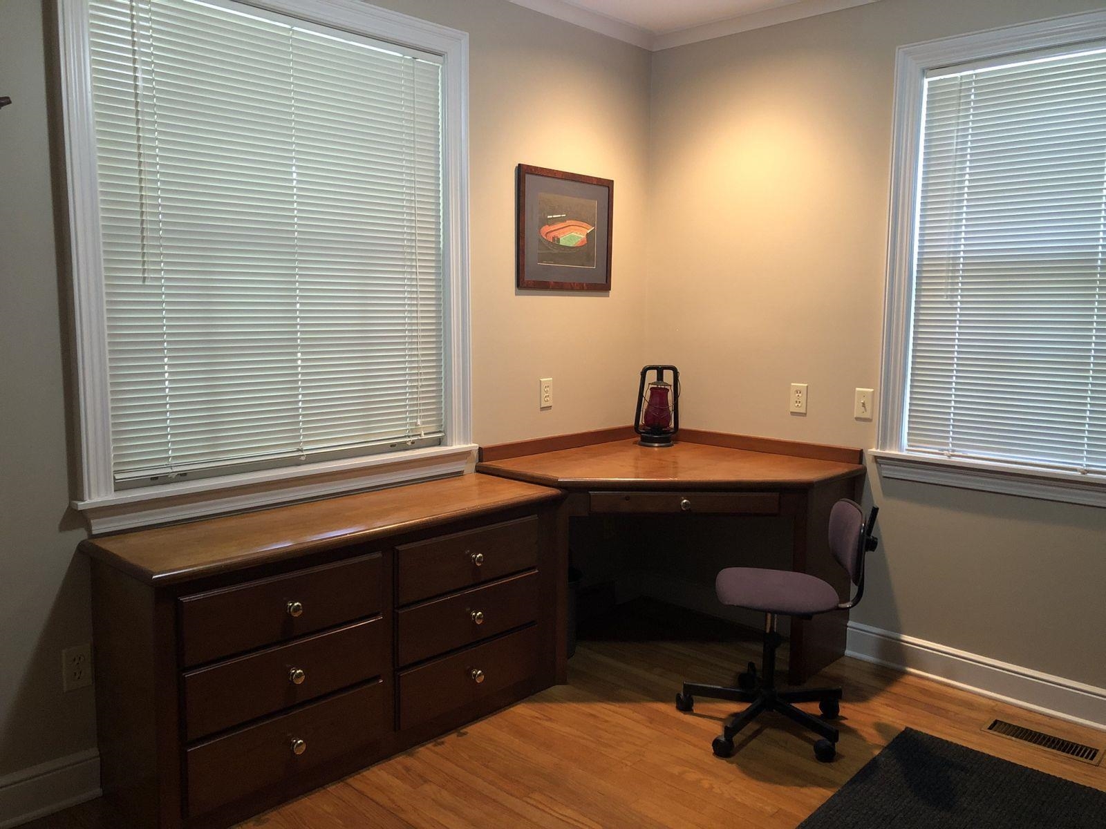 3334 Oak Road Bartlett, TN 38135 - Photo 19 of 40 a bathroom with a sink a mirror and a window