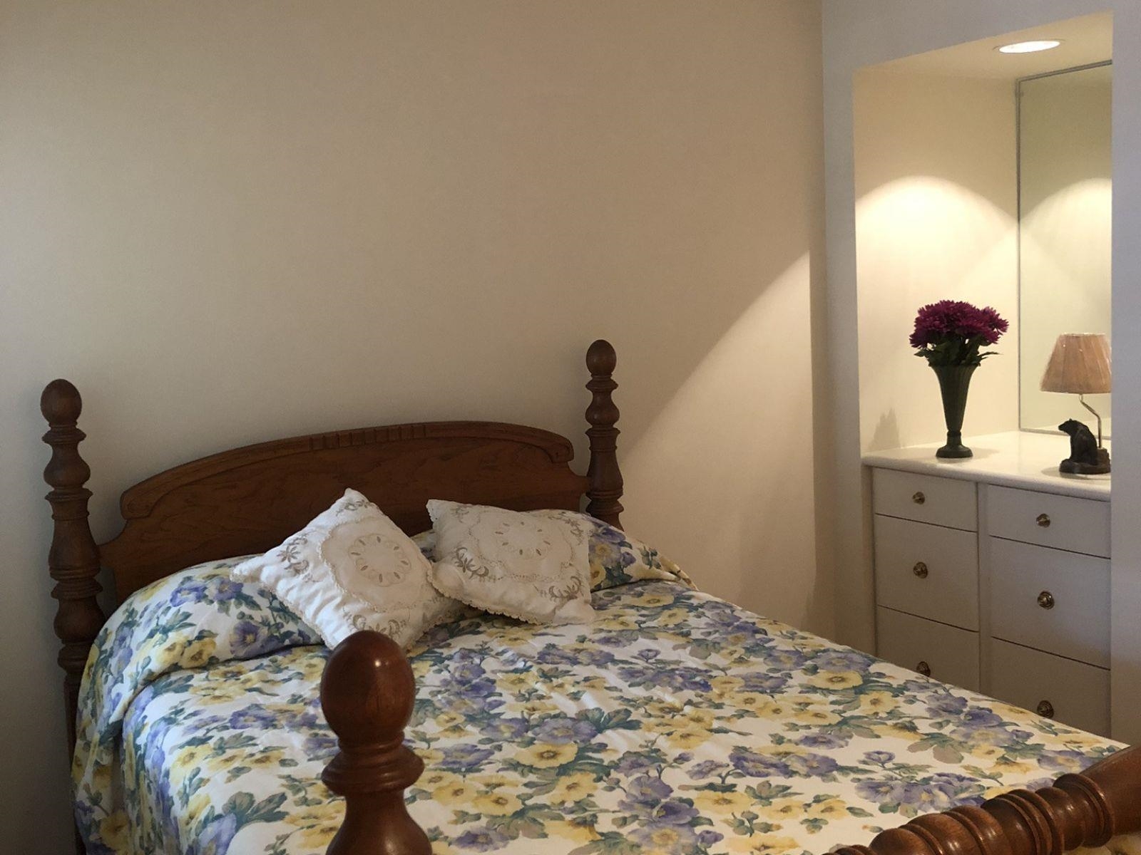 3334 Oak Road Bartlett, TN 38135 - Photo 21 of 40 a bedroom with a bed and a mirror on dresser