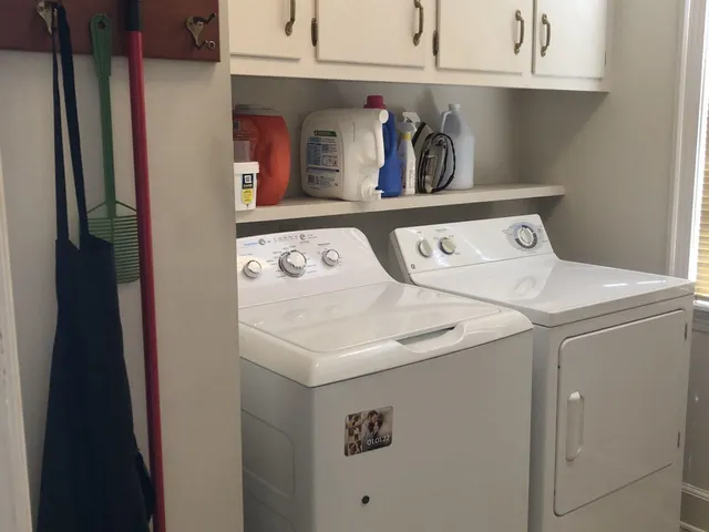 a utility room with dryer and washer