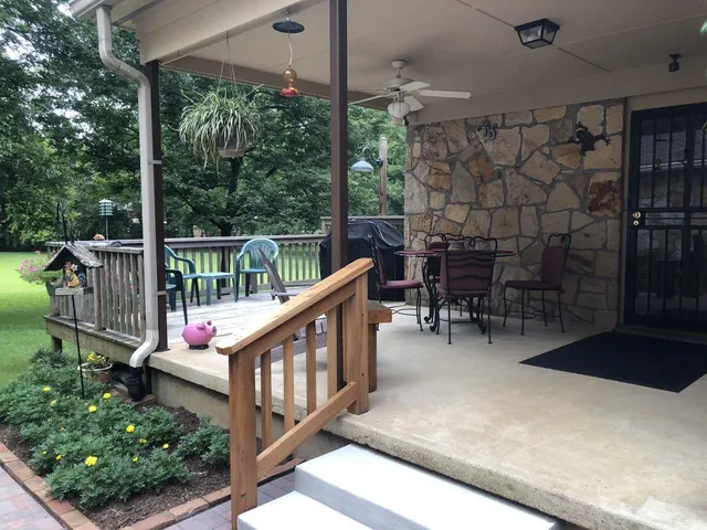 a balcony with wooden floor