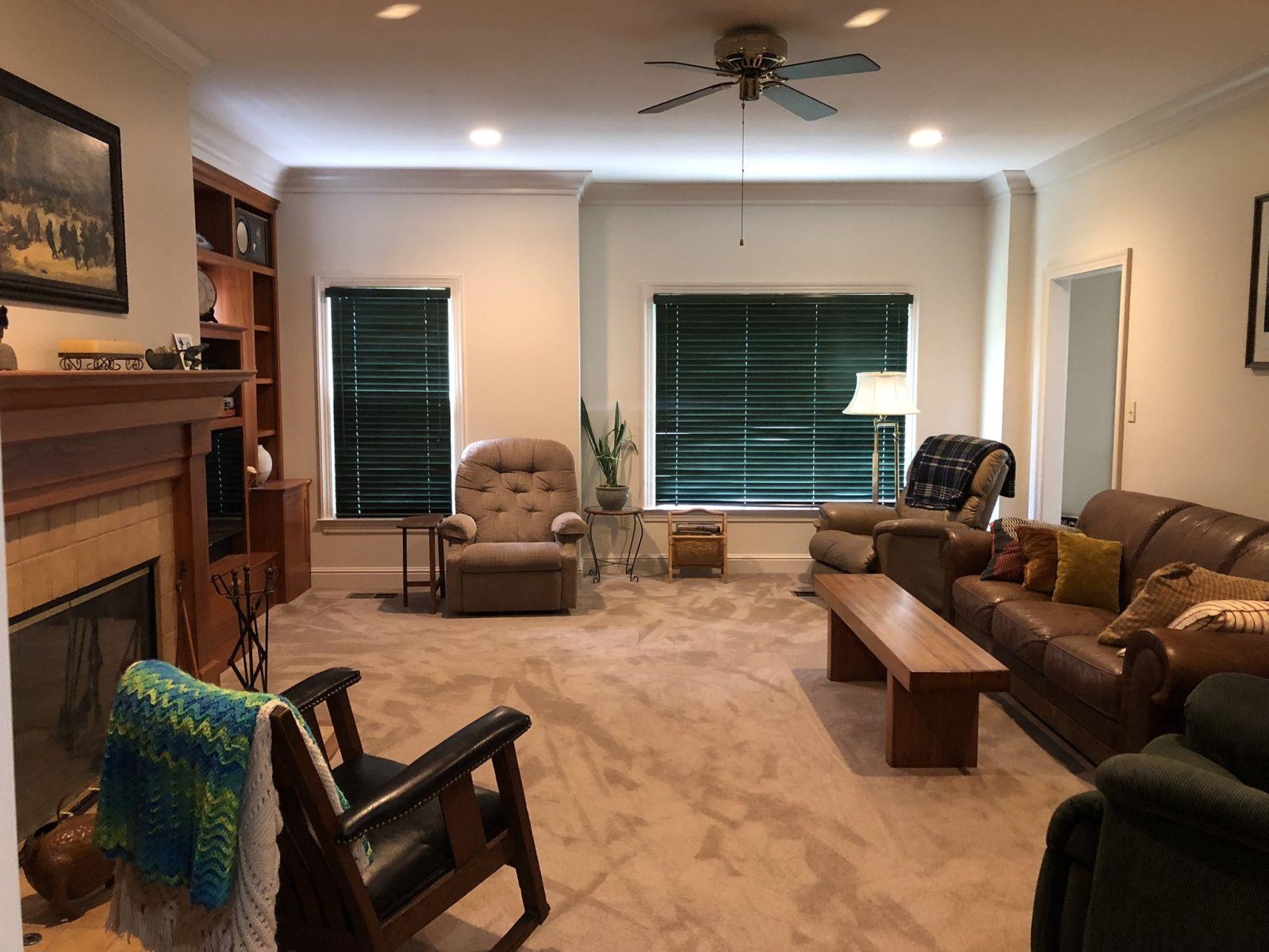 3334 Oak Road Bartlett, TN 38135 - Photo 5 of 40 a living room with furniture ceiling fan and a fireplace