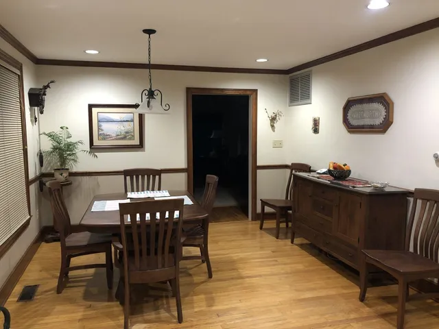 a view of a dining room with furniture