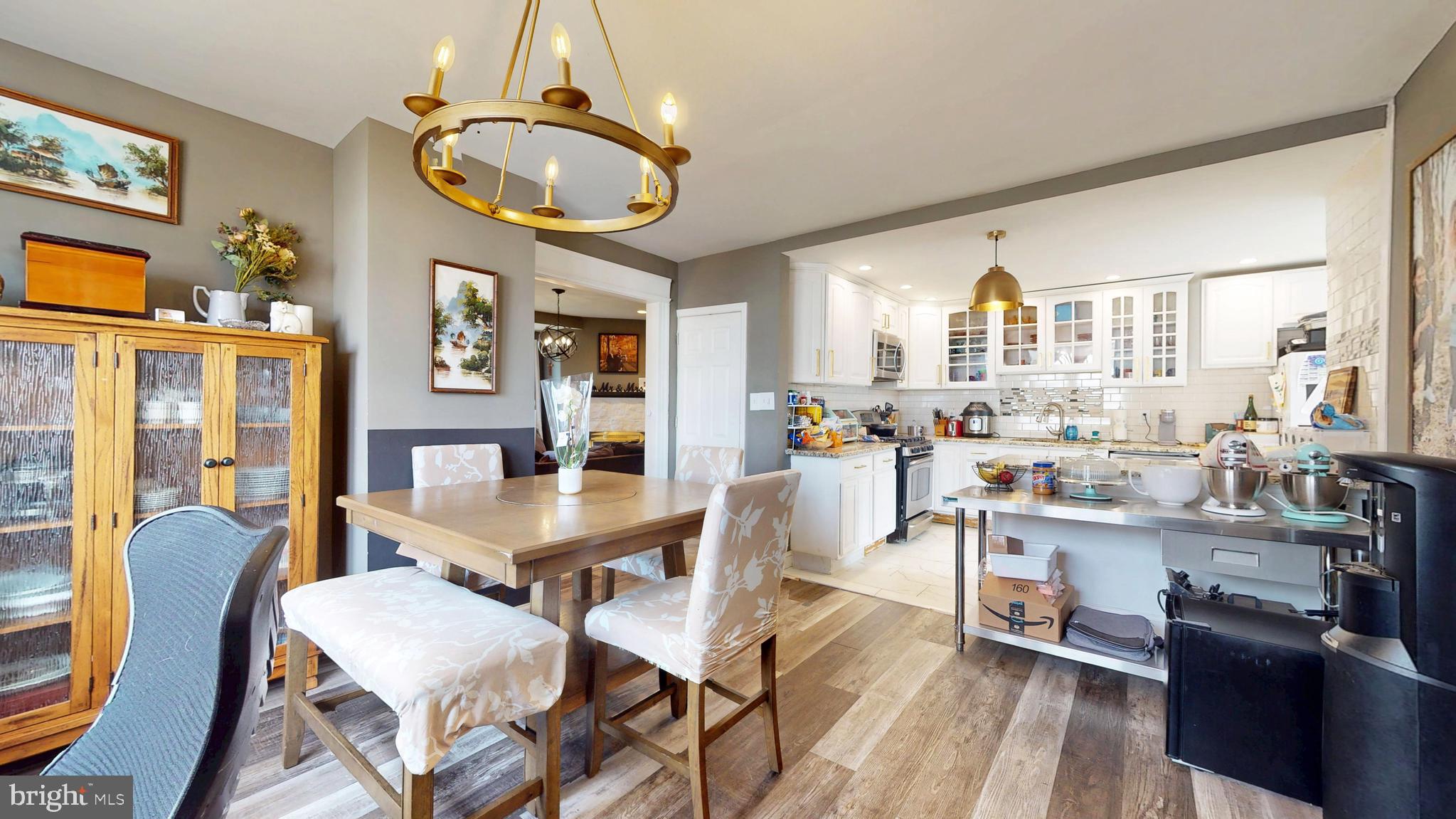 204 Haddon Avenue Collingswood, NJ 08108 - Photo 11 of 34 a view of a dining room with furniture and a chandelier