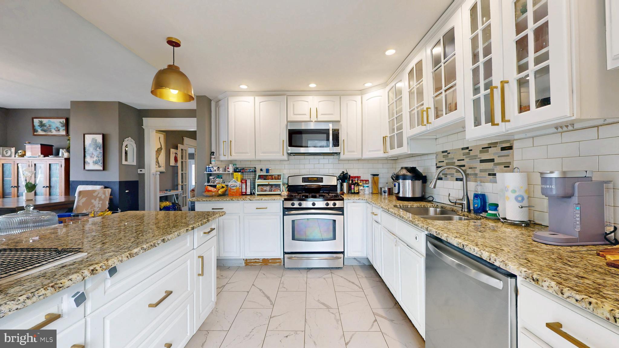 204 Haddon Avenue Collingswood, NJ 08108 - Photo 16 of 34 a kitchen with stainless steel appliances granite countertop a sink and cabinets