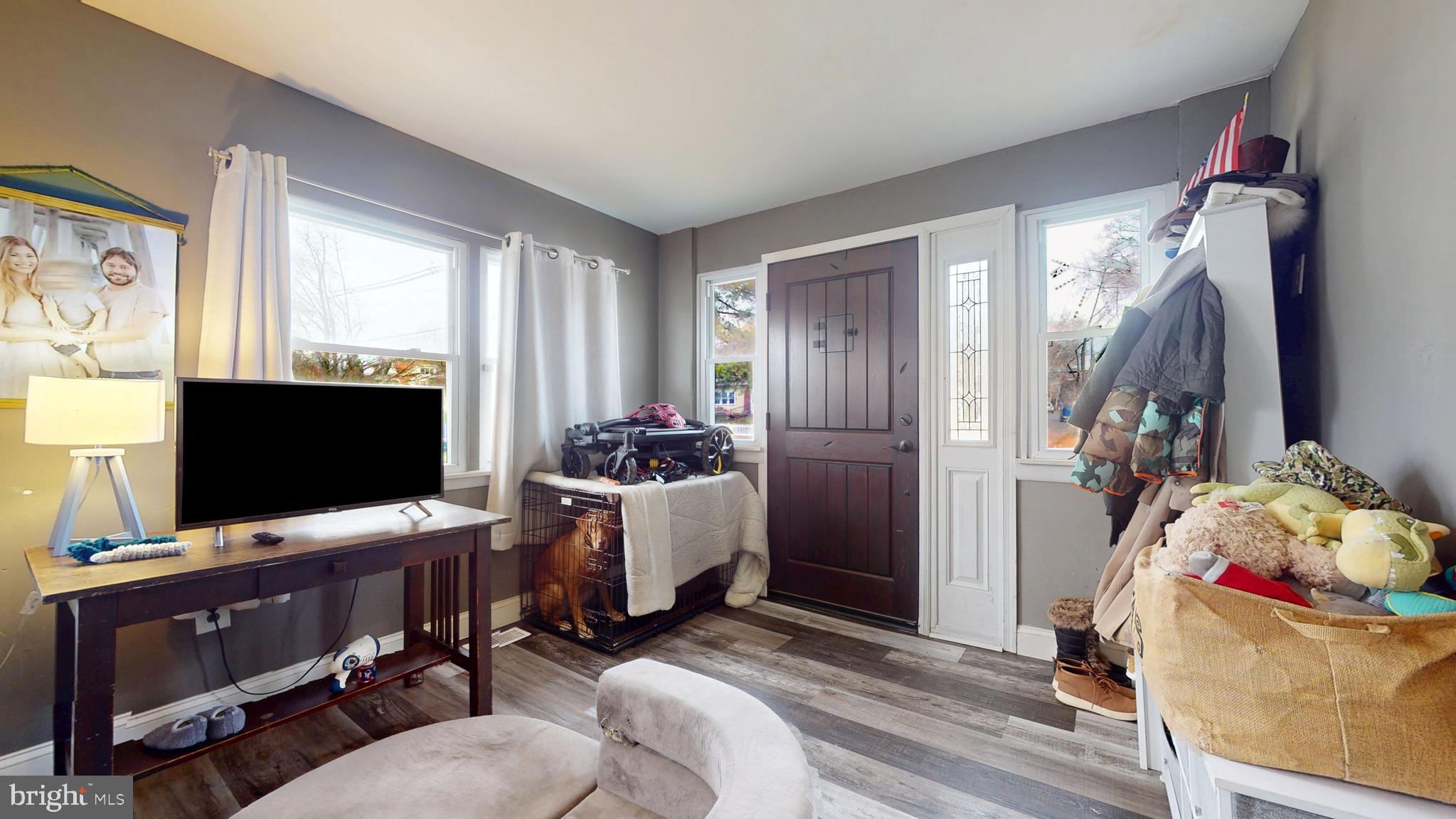 204 Haddon Avenue Collingswood, NJ 08108 - Photo 21 of 34 a bedroom with furniture and a flat screen tv