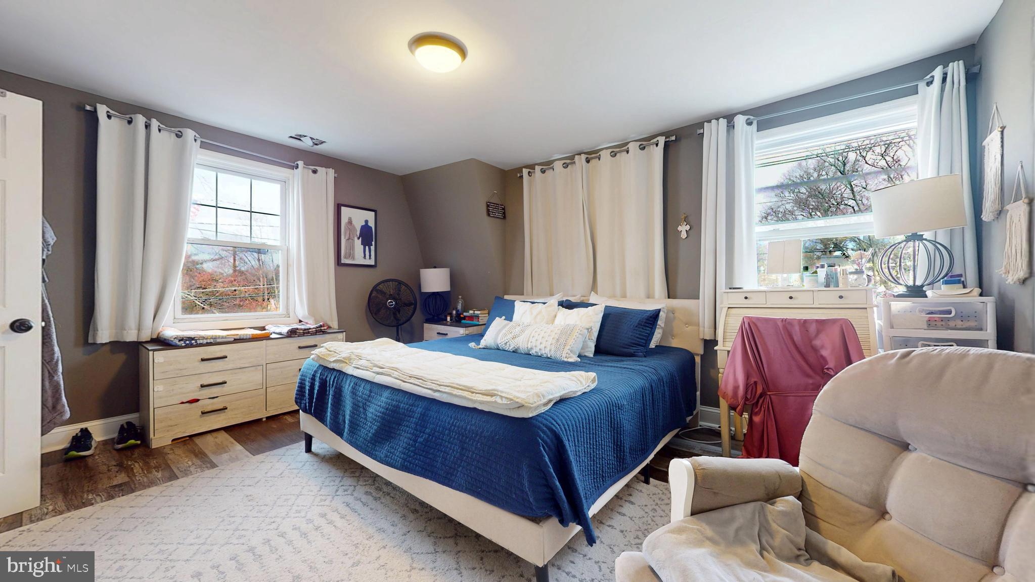 204 Haddon Avenue Collingswood, NJ 08108 - Photo 24 of 34 a bedroom with a bed and a couch