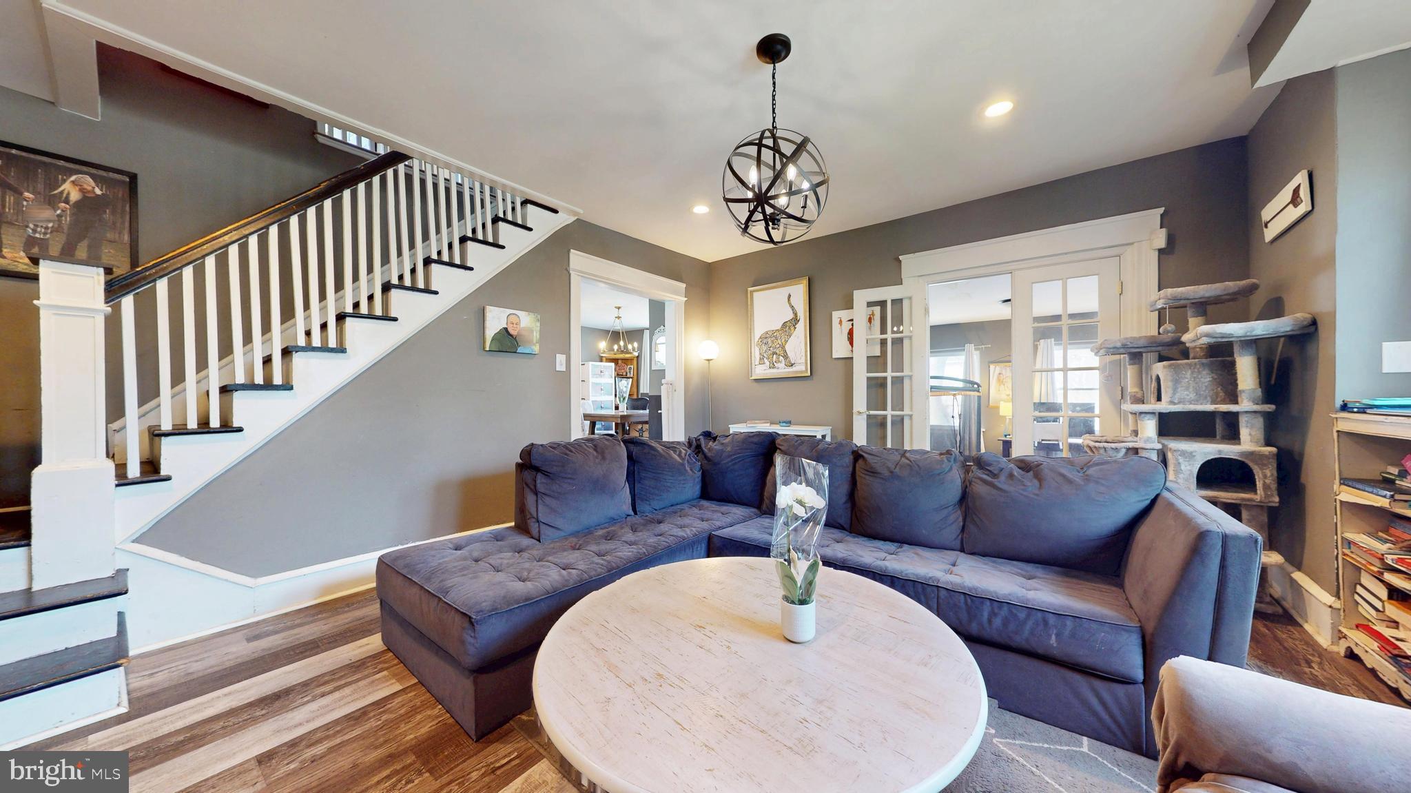 204 Haddon Avenue Collingswood, NJ 08108 - Photo 5 of 34 a living room with furniture chandelier and a dining table