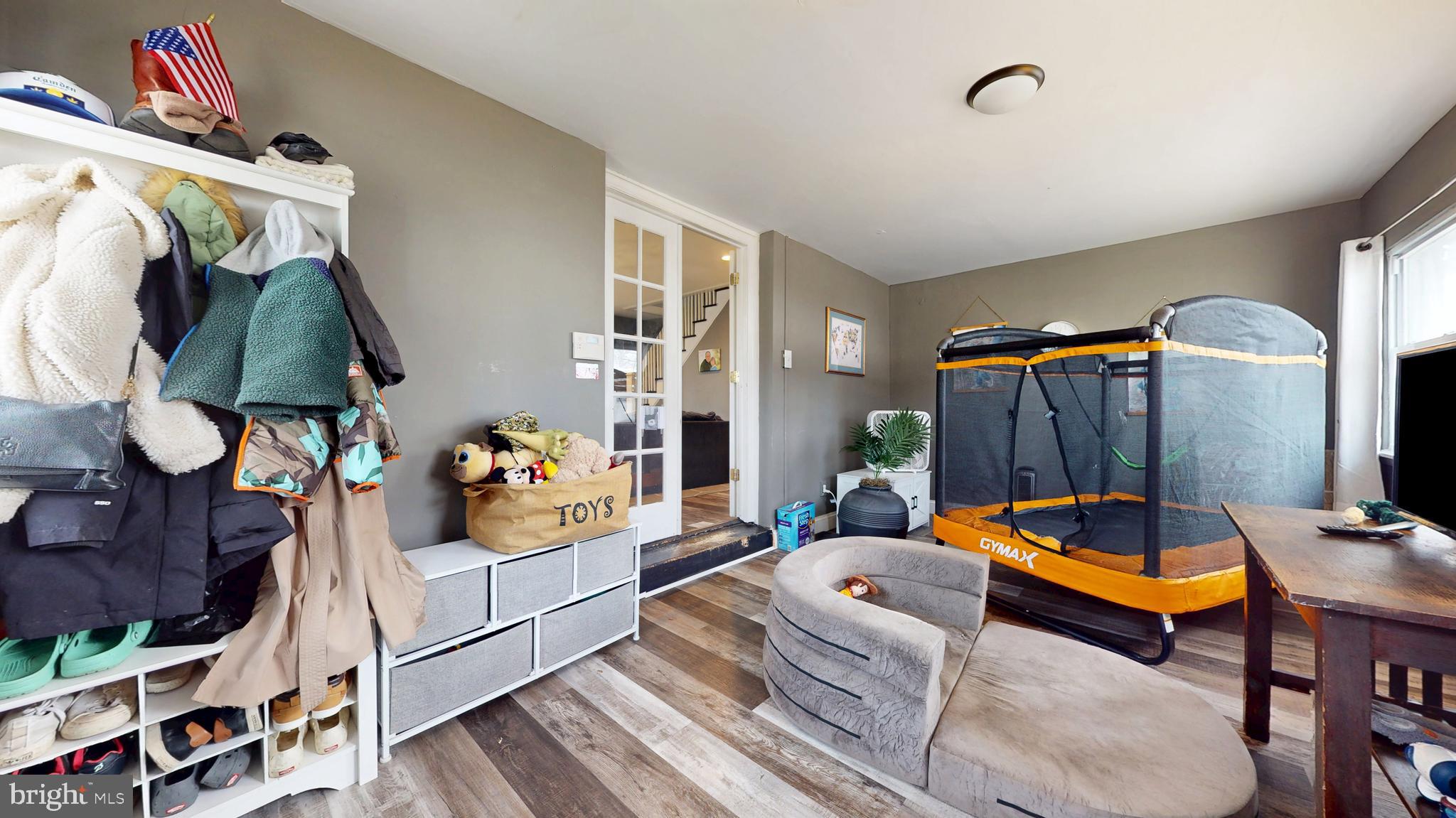 204 Haddon Avenue Collingswood, NJ 08108 - Photo 10 of 34 a living room with furniture and a gym