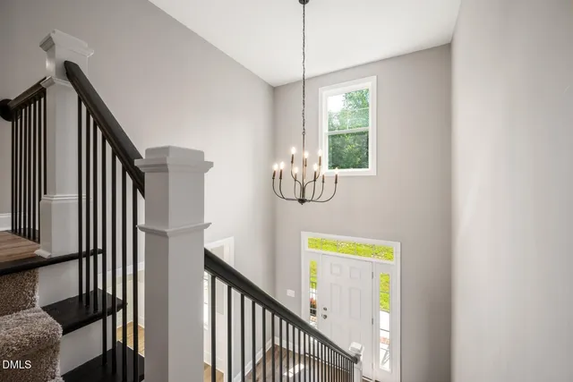 a view of a hallway with windows