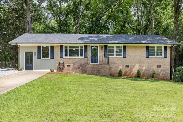 front view of a house and a yard