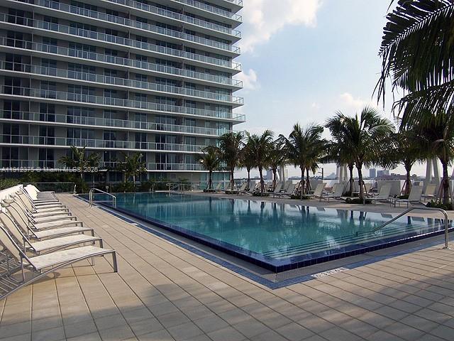 1111 Southwest 1st Avenue, Unit 3016N Miami, FL 33130 - Photo 9 of 11 a view of swimming pool with outdoor seating