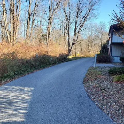 a kitchen with stainless steel appliances granite countertop a refrigerator sink and stove