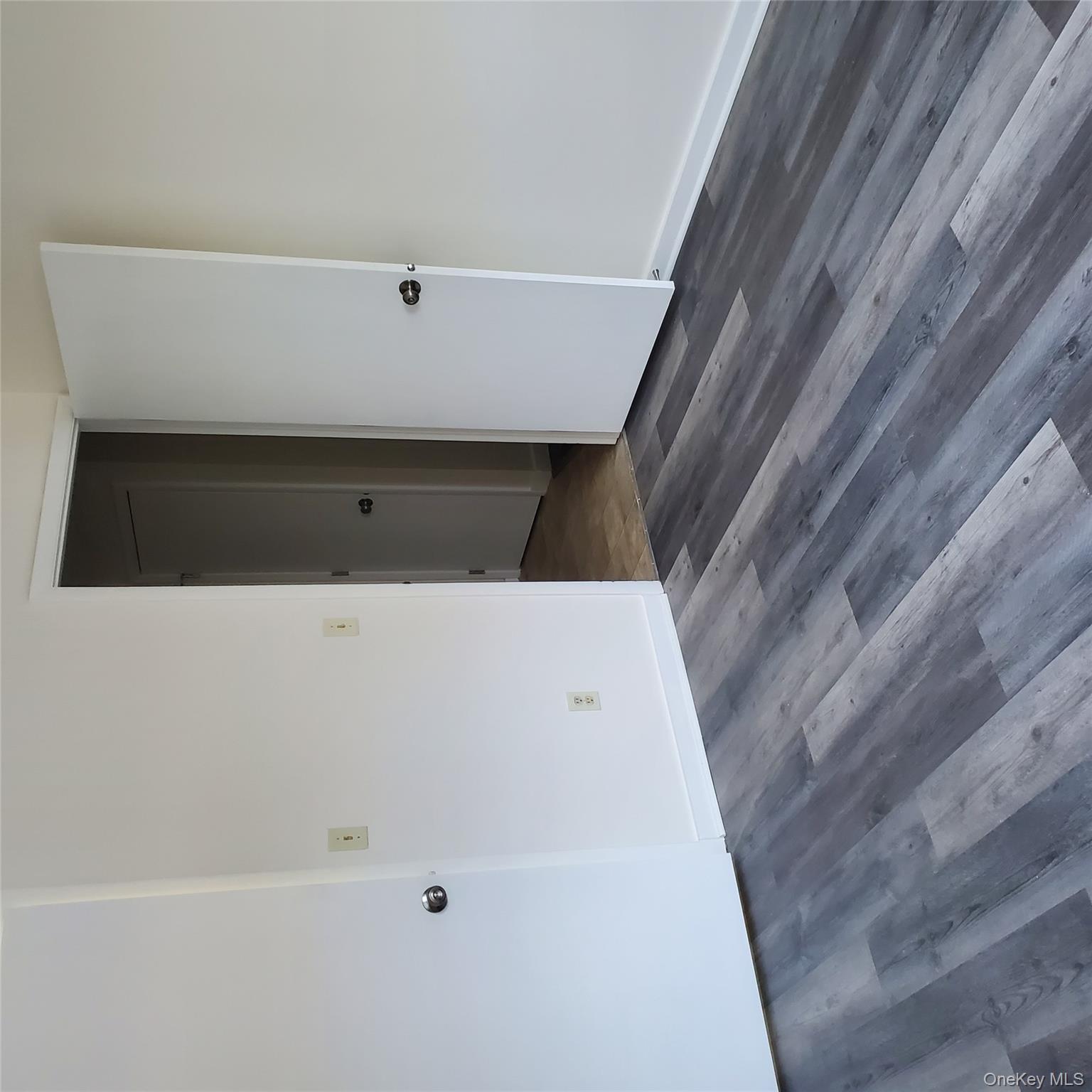 160-166 W Road, Unit C34 Pleasant Valley, NY 12569 - Photo 5 of 8 a view of a room with wooden floor