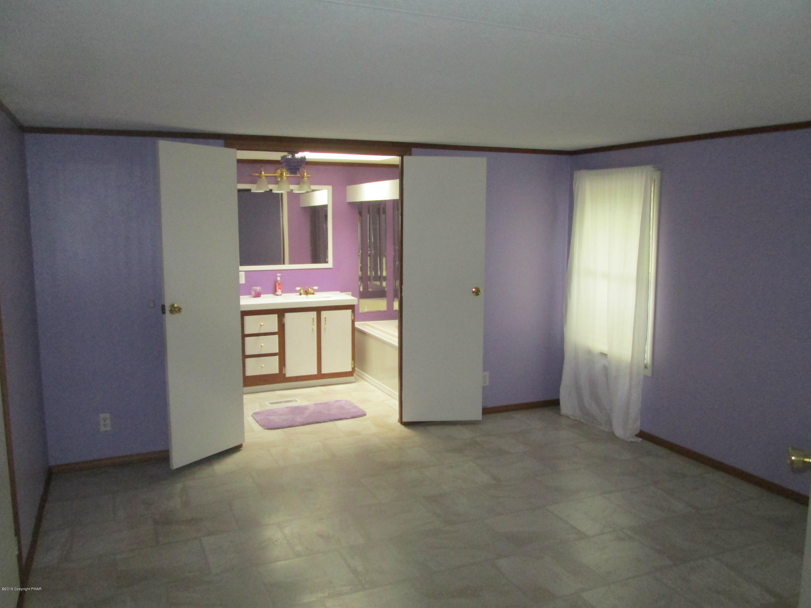 1907 Donalds Road Effort, PA 18330 - Photo 3 of 9 a view of an empty room with a window