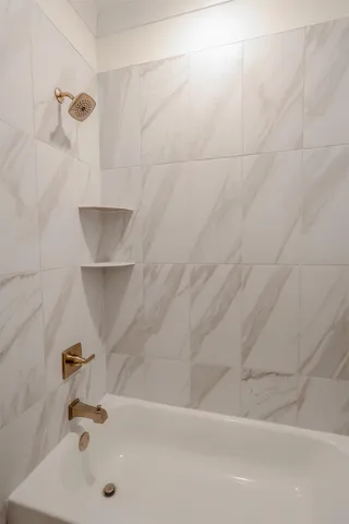 a bathroom with a bathtub