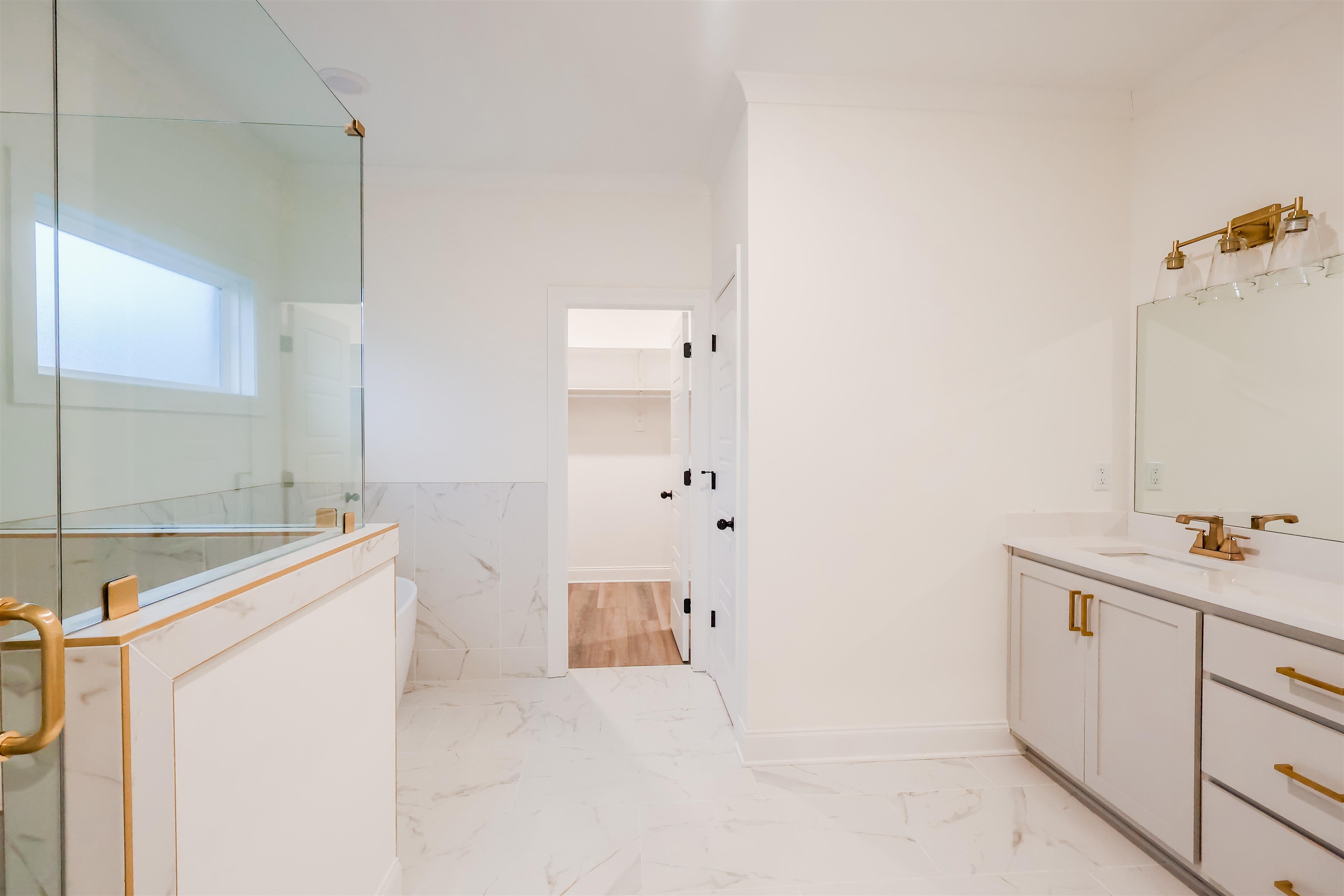 125 Columbia Way Atoka, TN 38004 - Photo 20 of 28 a bathroom with a sink a toilet and mirror