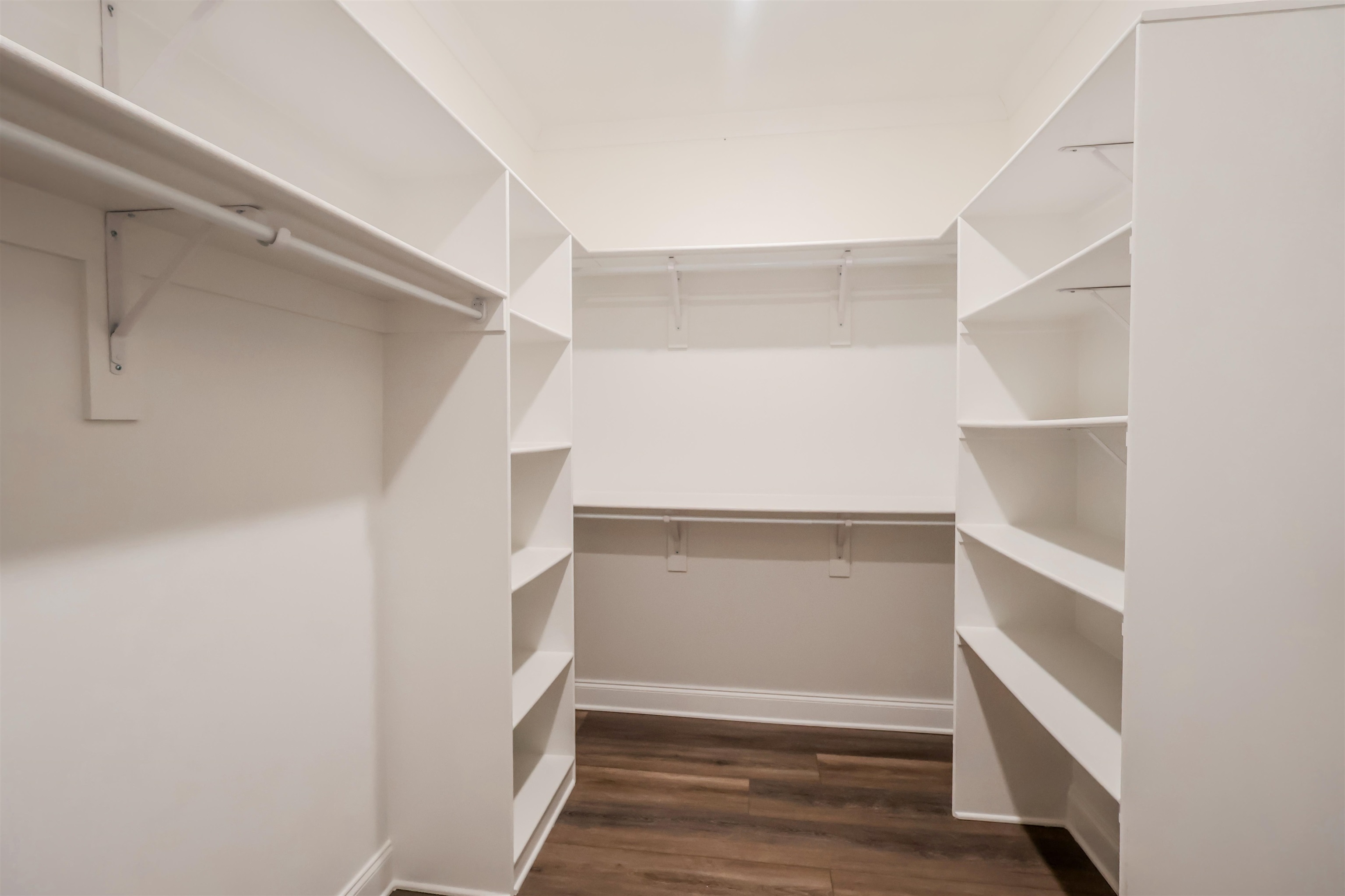 125 Columbia Way Atoka, TN 38004 - Photo 23 of 27 Spacious closet with dark wood-style floors