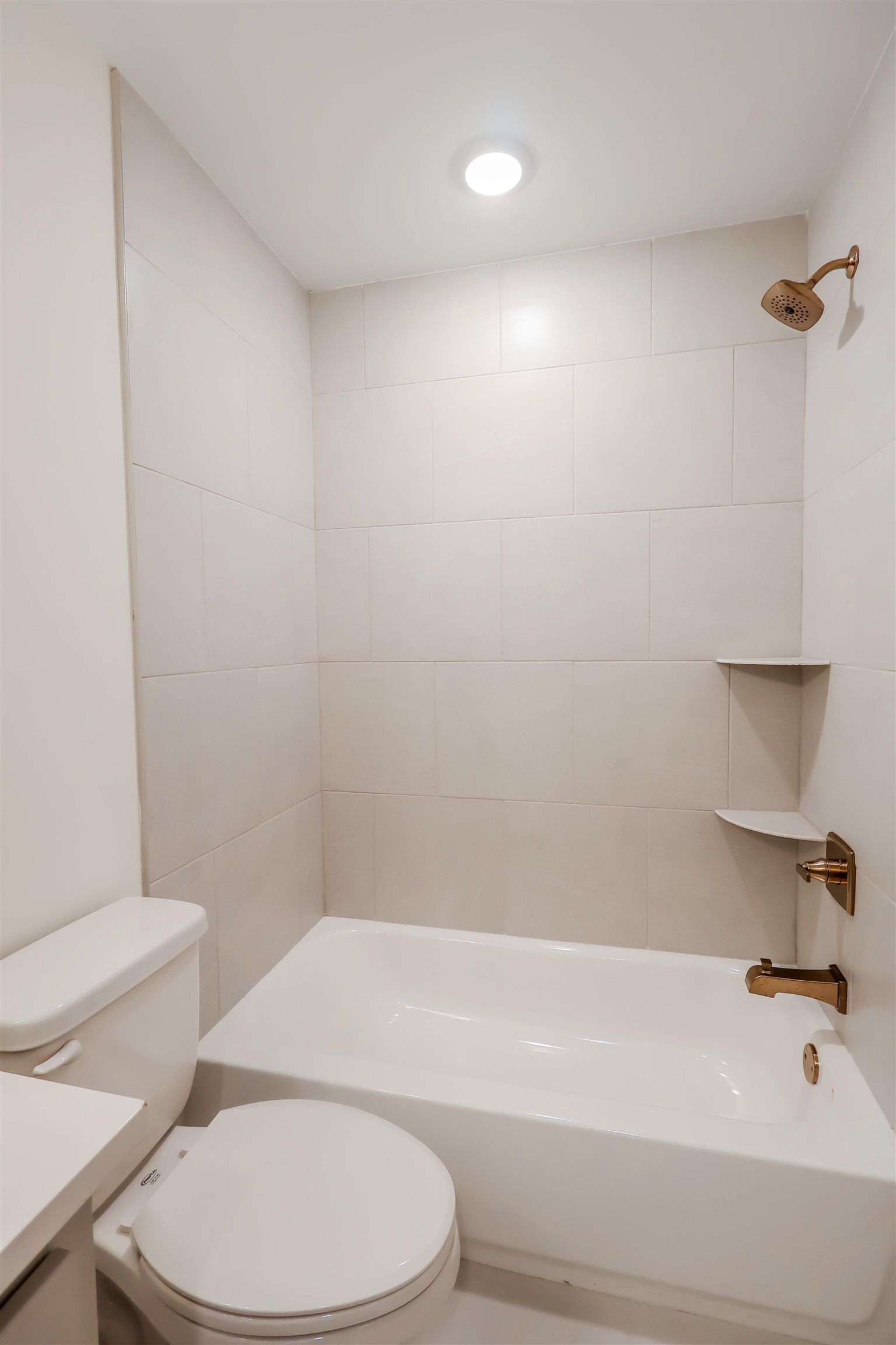 125 Columbia Way Atoka, TN 38004 - Photo 26 of 27 Bathroom featuring bathing tub / shower combination and vanity