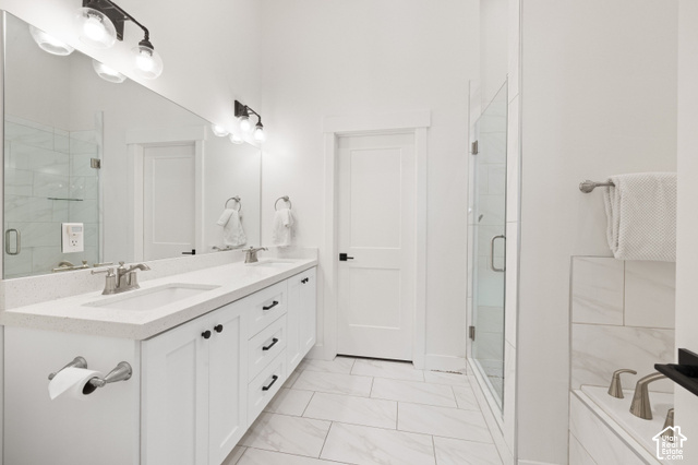 1141 520 West Midway, UT 84049 - Photo 17 of 40 Dual vanity with integrated sinks, brushed nickel fixtures, and white shaker-style cabinetry