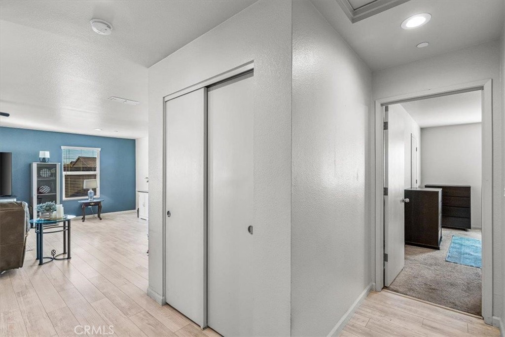 784 Taryn Court Merced, CA 95341 - Photo 21 of 39 wooden floor and windows in a room