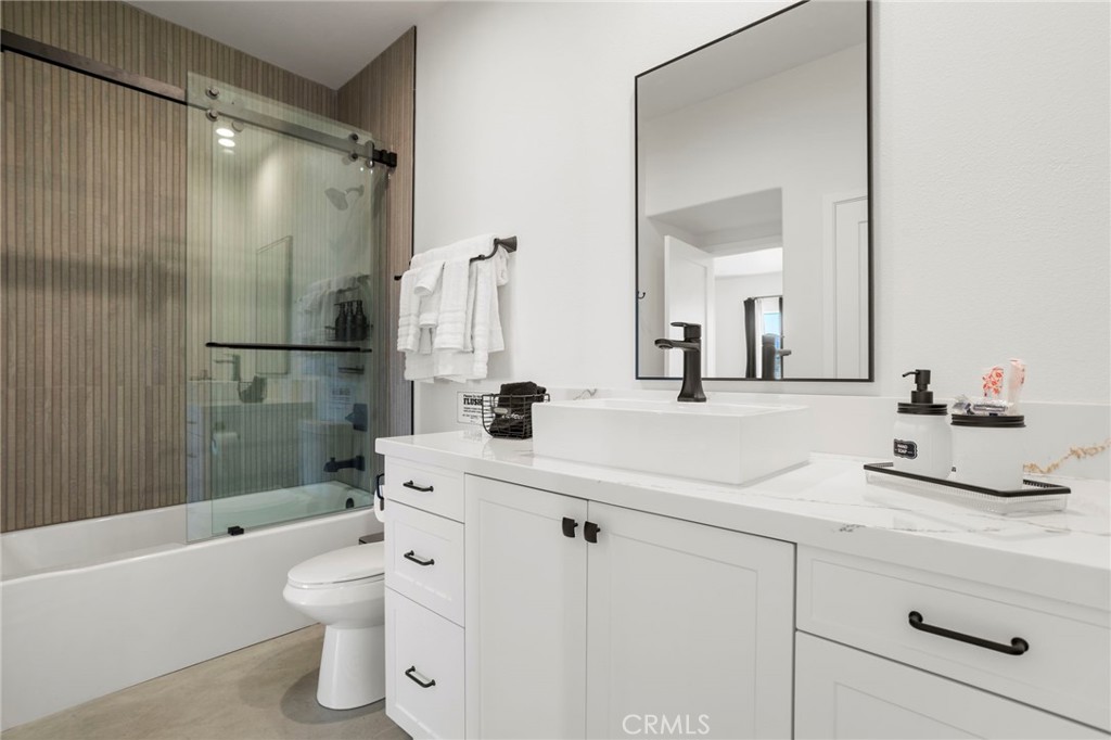 5145 Tom Mix Road Pioneertown, CA 92268 - Photo 39 of 75 a bathroom with a sink a toilet and shower