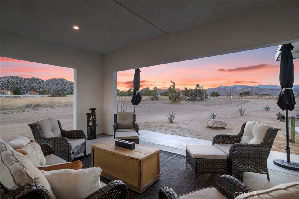 5145 Tom Mix Road Pioneertown, CA 92268 - Photo 74 of 75 a view of a terrace with couches and a table