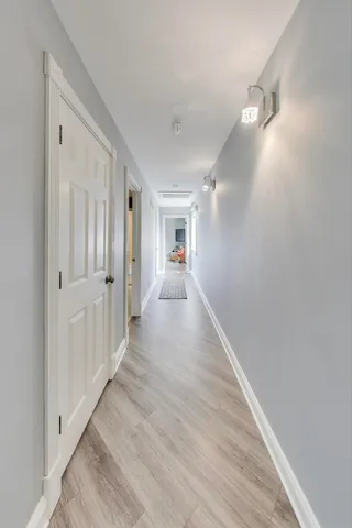 a bedroom with double bed and a window