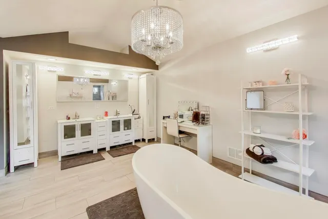 a bathroom with a toilet sink and shower