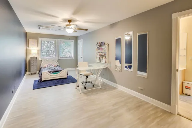 a workspace with furniture and window