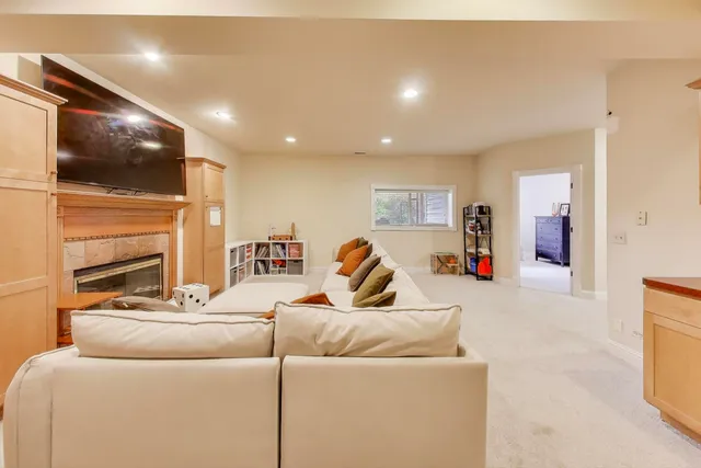 a living room with furniture gym equipment and a view of living room
