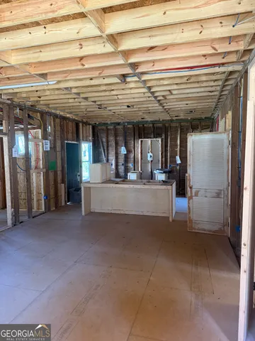 a view of a building with a refrigerator and a table