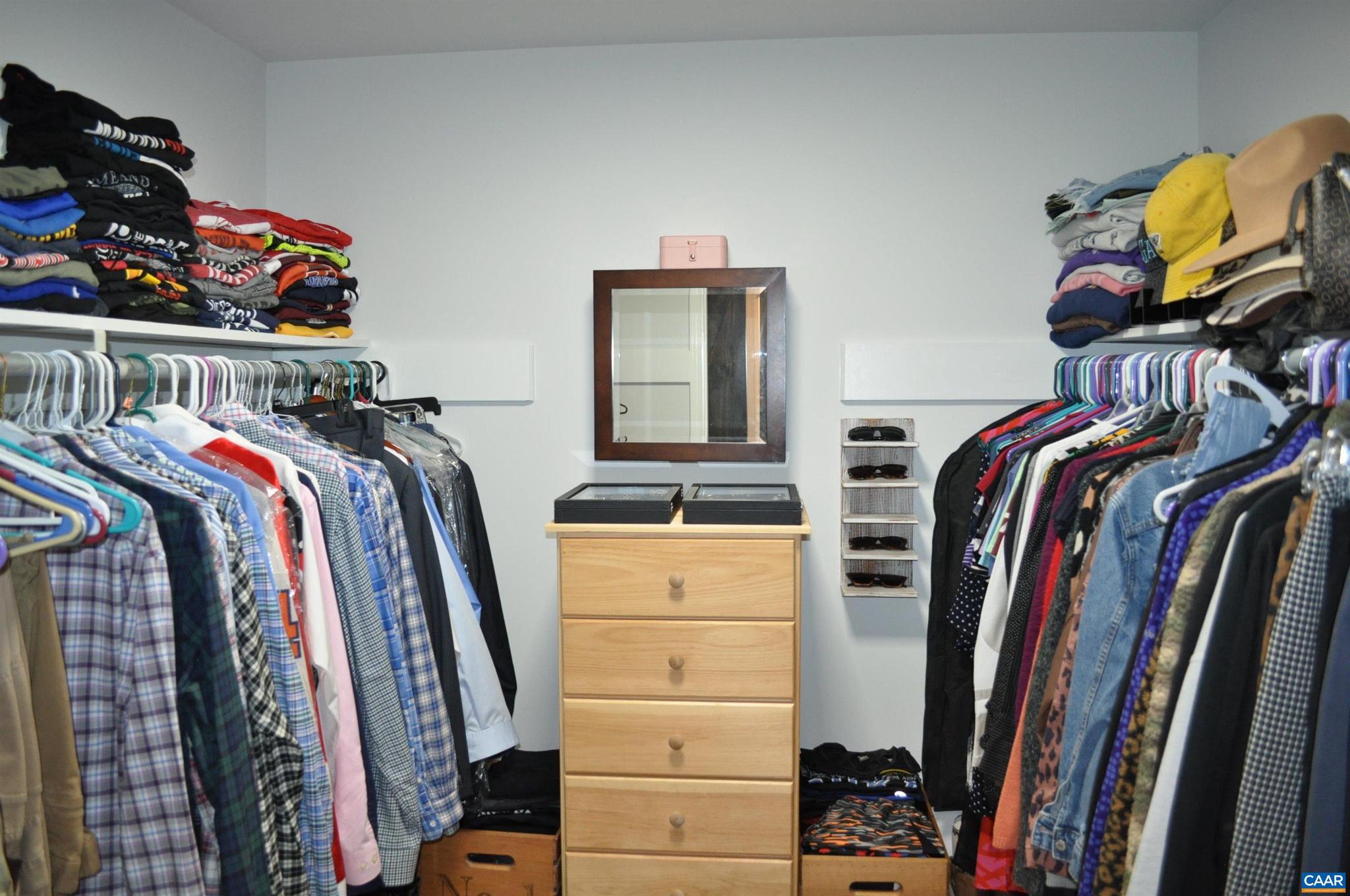 3257 Martin Kings Road Charlottesville, VA 22902 - Photo 26 of 49 a view of walk in closet with clothes and shoes